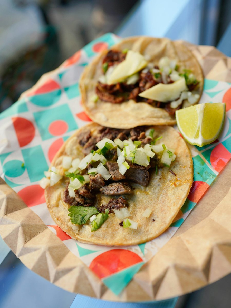 Street tacos with onion, cilantro and lime